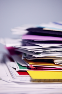 Colorful, messy pile of file folders